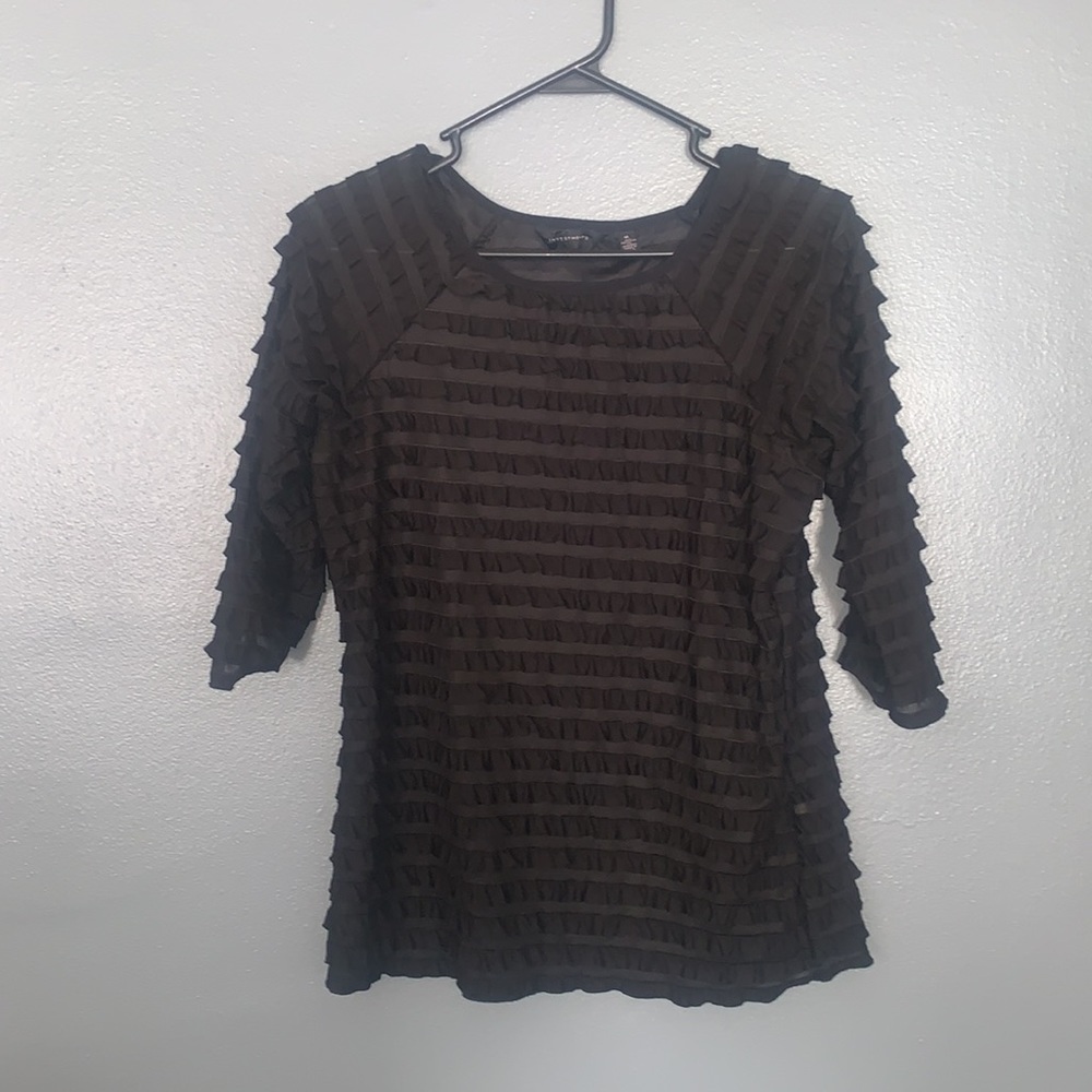 Investments brand ruffled black top